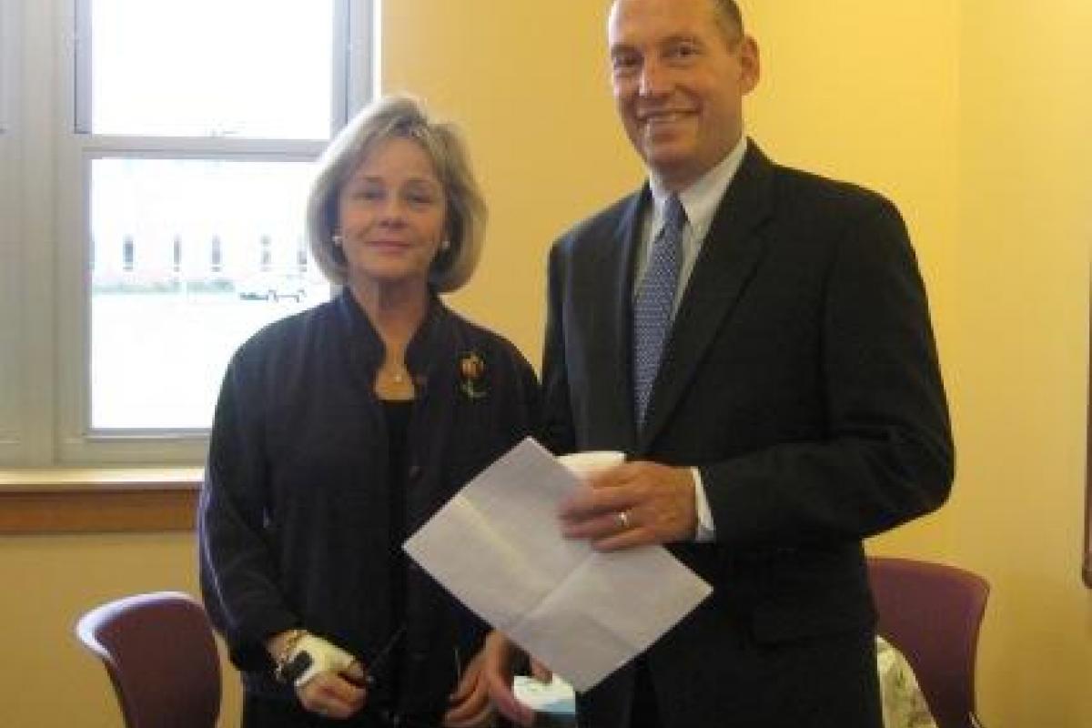 Deborah Swanson of the Plymouth County Extension Service and Register John R. Buckley, Jr.